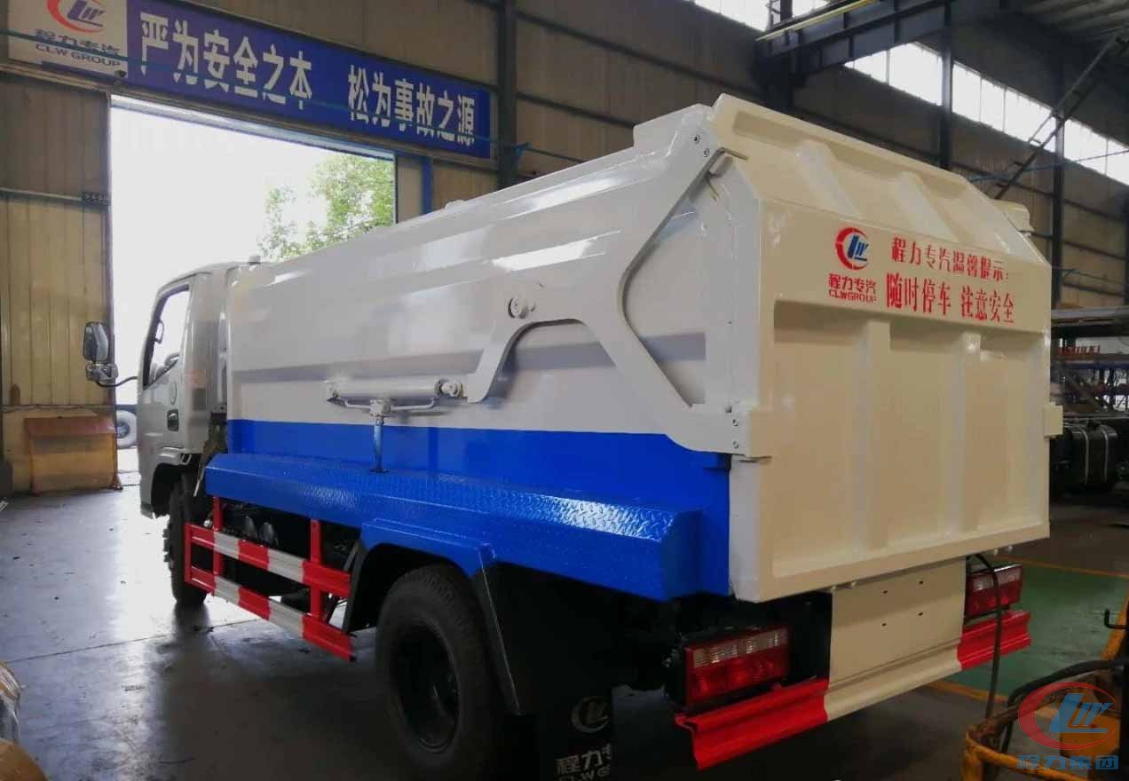 东风多利卡挂桶式垃圾车,挂桶式生活垃圾车 实拍图